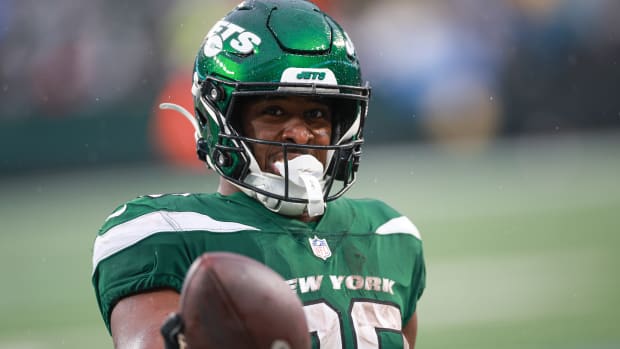 Jets' RB Breece Hall (20) after scoring a touchdown vs. Houston